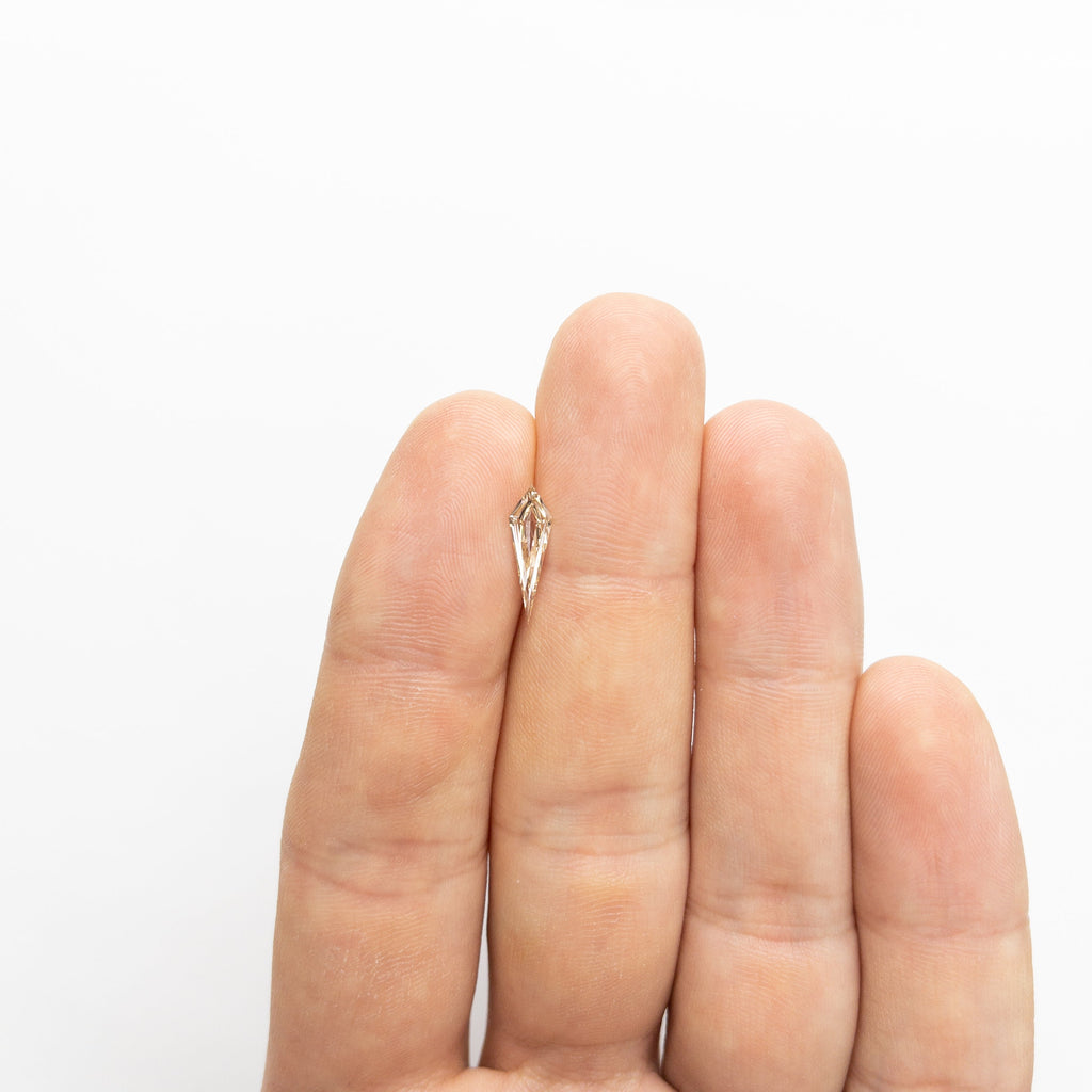 0.58ct 13.83x4.36x1.91mm VS+ Champagne Kite Step Cut 18518-01 - Misfit Diamonds