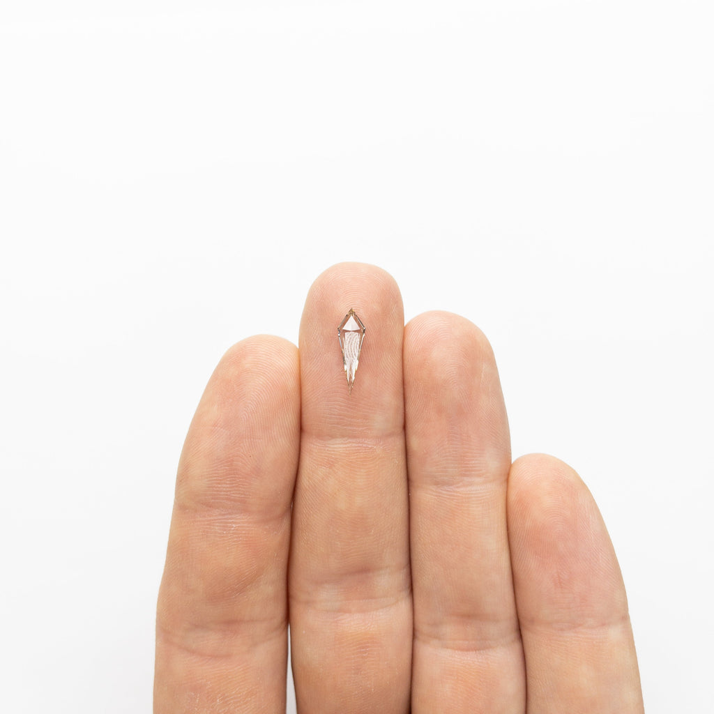 0.58ct 13.83x4.36x1.91mm VS+ Champagne Kite Step Cut 18518-01 - Misfit Diamonds