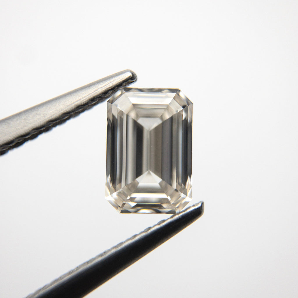 1.06ct 6.94x4.77x3.01mm VS2 Champagne Emerald Step Cut 18535-01 - Misfit Diamonds