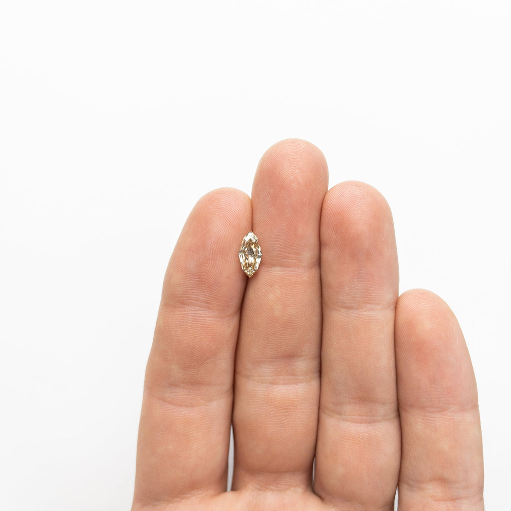 1.08ct 10.49x5.21x2.84mm SI1 Champagne Step Cut Marquise 18839-03 - Misfit Diamonds